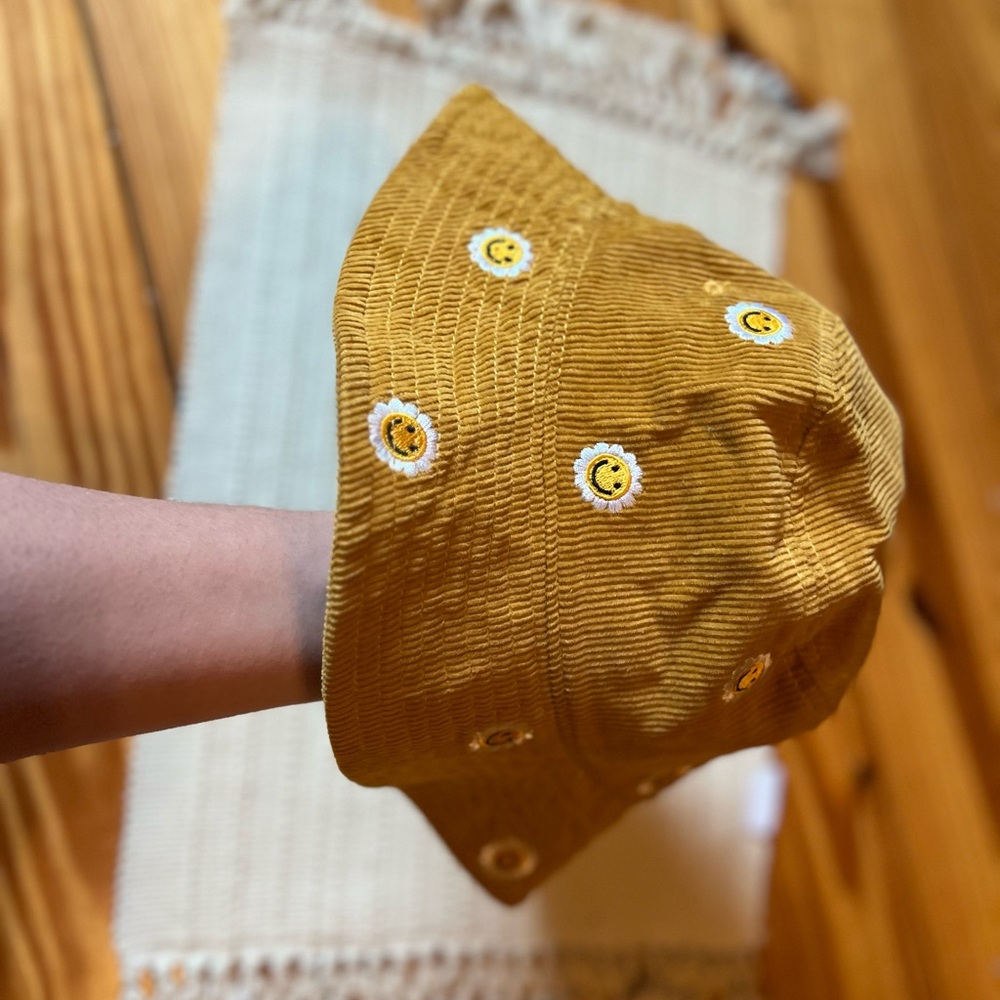 target bucket hat with sunflowers and smiley face